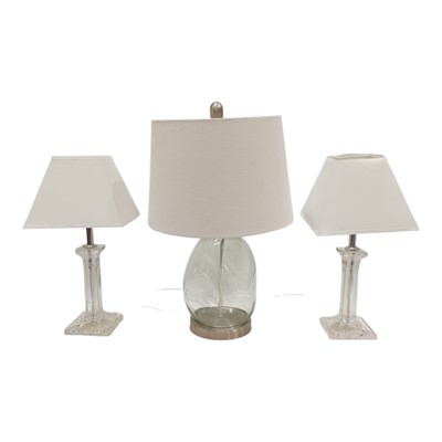 Lot 73 - A clear glass dimple table lamp, 50 cm high...