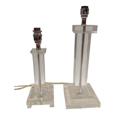 Lot 76 - Two heavy glass table lamps with no shades....