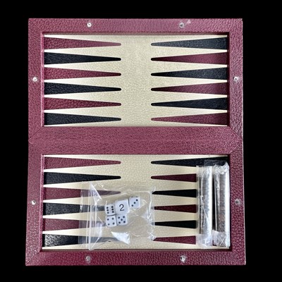 Lot 77 - A burgundy leather travel backgammon set by...