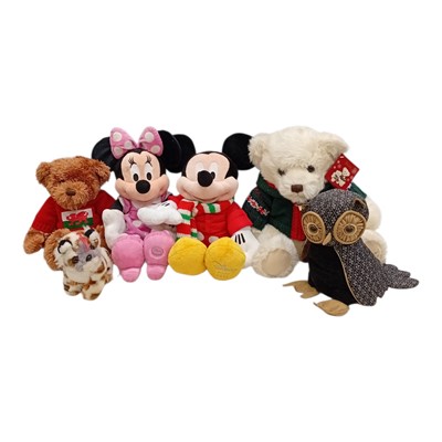 Lot 84 - A collection of plush toys, including a...