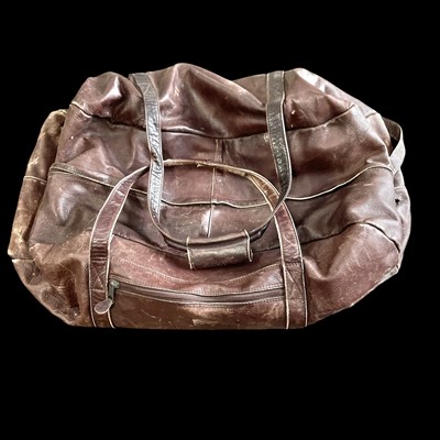 Lot 92 - A large vintage leather holdall, approx 70x35cm.