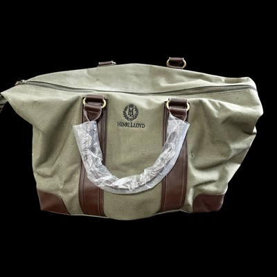 Lot 96 - A new Henry Lloyd canvas holdall, with some...