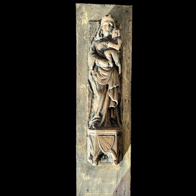 Lot 105 - A vintage hand-carved panel depicting the...