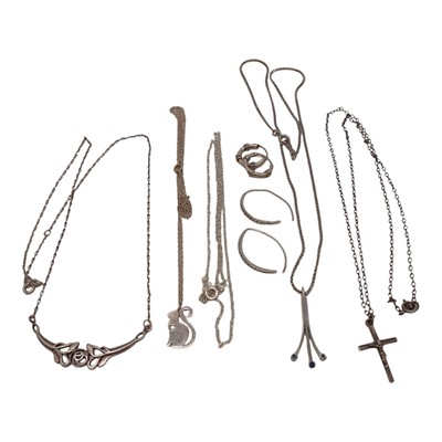 Lot 111 - A silver cat pendant and chain with assorted...