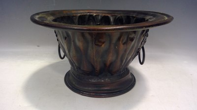 Lot 119 - A Copper Effect Ice Bucket 15cm tall, 29cm in...