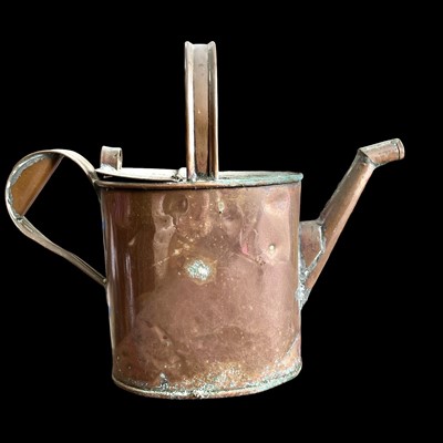Lot 128 - A copper watering can, 28cm overall height.