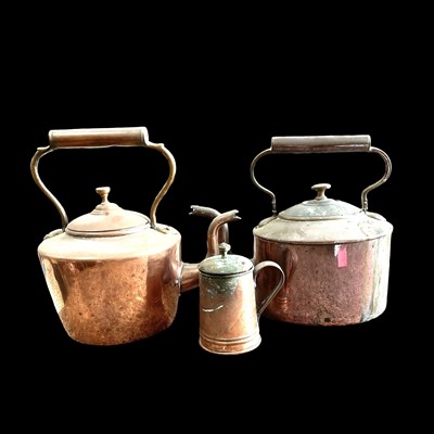 Lot 134 - Two copper kettles and a lidded tankard.
