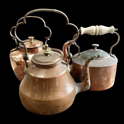 Lot 135 - Three copper kettles.
