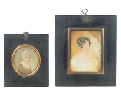 Lot 594 - Two early 19th century family portrait miniatures.