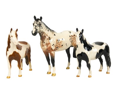 Lot 718 - Three Beswick horses.