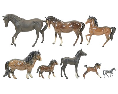 Lot 658A - A Beswick matt black horse and foal.