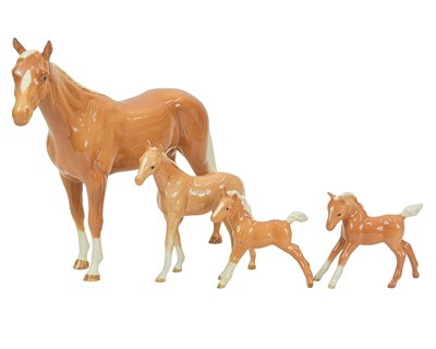Lot 650 - Four Beswick palomino horses.
