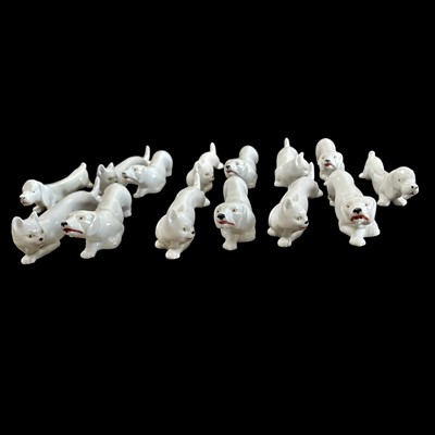 Lot 33 - A set of six porcelain dog & cat knife rests,...