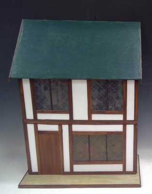 Lot 43 - A Doll's House with Contents and Two Dolls....