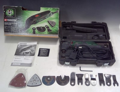 Lot 23 - A Parkside Multi Tool and Accessories. The...