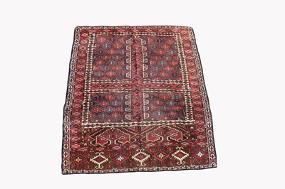 Lot 436 - A Turkoman Hatchli rug, the quartered field...