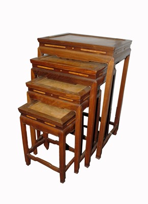 Lot 26 - A Chinese hardwood quartetto of tables, with...