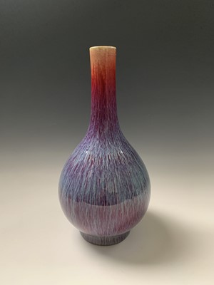 Lot 49 - A Chinese flambe glazed bottle vase, 18th...