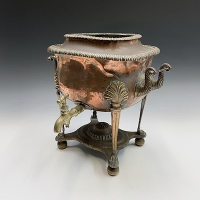 Lot 3 - A George III twin handled copper and brass tea...