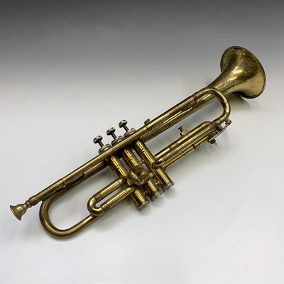 Lot 34 - A B&M champion brass trumpet. Length 50.5cm.