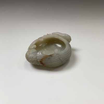 Lot 22 - A Chinese carved jade brush pot, 18th century,...