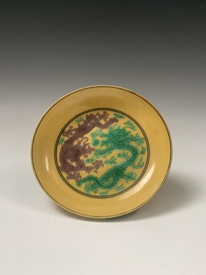 Lot 126 - A Chinese yellow ground porcelain dish,...