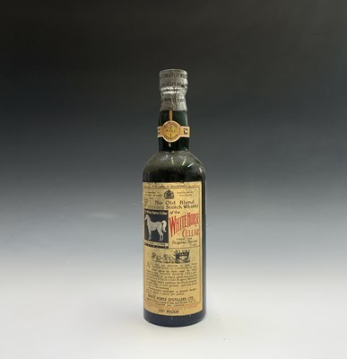 Lot 21 - Lagavulin Distillery, a bottle of White horse...