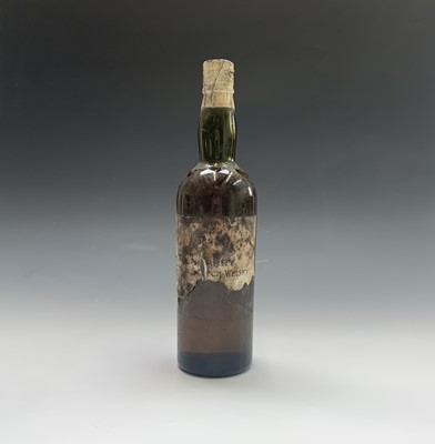 Lot 22 - A bottle of vintage whisky, indistinctly...