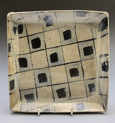 Lot 502 - A studio pottery square dish Impressed marks,...