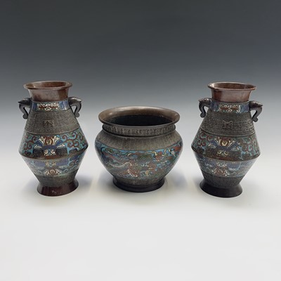 Lot 40 - A pair of Chinese bronze champleve vases and a...