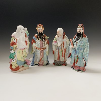 Lot 163 - A Chinese porcelain figure of buddha, 20th...