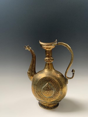 Lot 357 - An Indian brass ewer, Deccan, 18th century,...