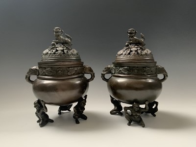 Lot 99 - A pair of Japanese bronze censers, each with...