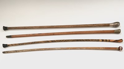 Lot 387 - A silver Niello topped walking cane, with...
