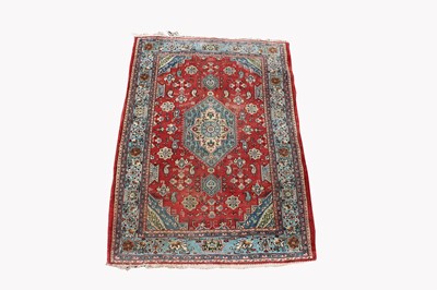 Lot 437 - A Tabriz rug, North West Persia, the madder...