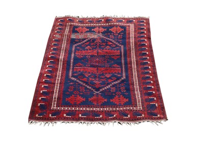 Lot 445 - A Belouch rug, the indigo field with a large...