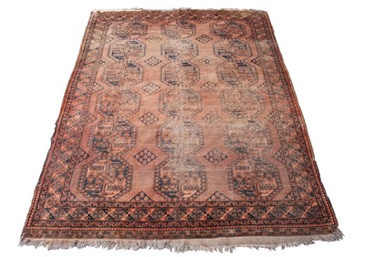 Lot 454 - An Afghan Ersari carpet, the camel field with...
