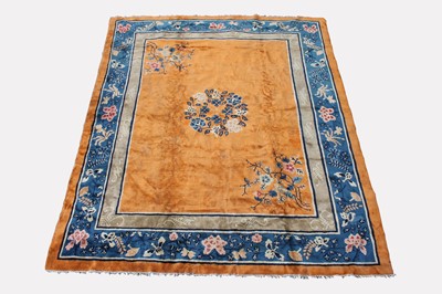 Lot 478 - A Chinese Peking carpet, the apricot field...