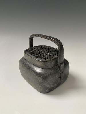 Lot 30 - A Chinese bronze hand warmer, 18th/19th...