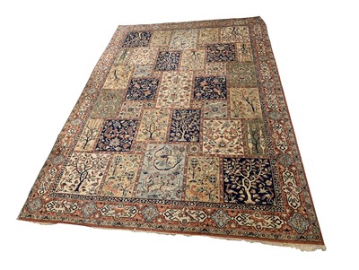 Lot 467 - A machine made carpet, of Baktihari Persian...