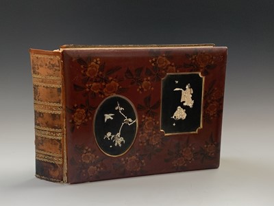 Lot 122 - A Japanese red lacquer photo album, late 19th...