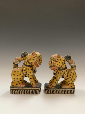 Lot 369 - A pair of Indian carved wood figures of...