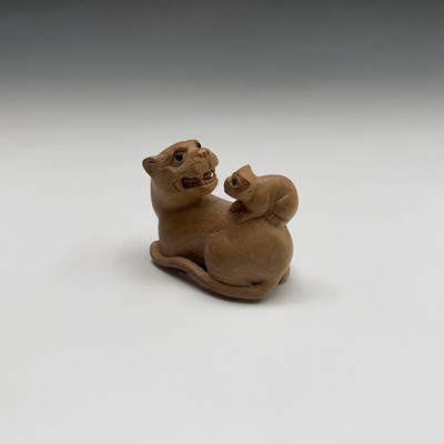 Lot 277 - A Japanese carved wood netsuke, signed, width...