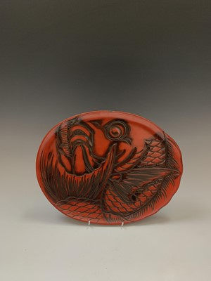 Lot 135 - A Japanese red lacquer tray, early 20th...