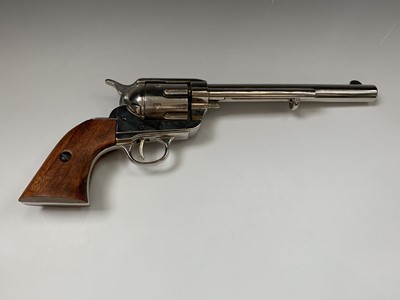 Lot 604 - A Denix replica colt 45. with caps in original...
