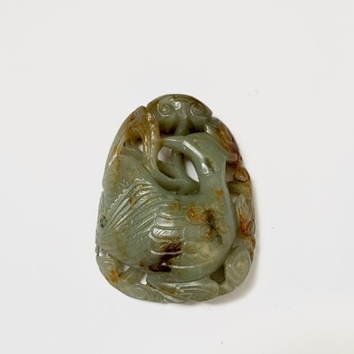 Lot 19 - A large Chinese carved & reticulated celadon...
