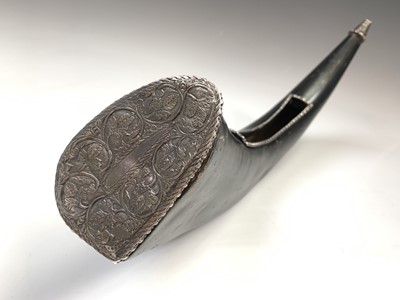Lot 370 - An Islamic horn and white metal mounted powder...