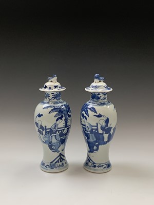 Lot 137 - A near pair of Chinese blue and white baluster...