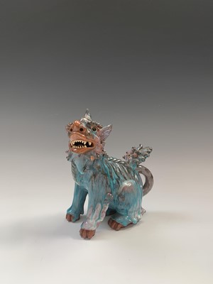 Lot 57 - A Japanese earthenware shishi or temple dog,...