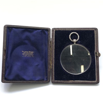 Lot 2546 - A silver mounted glazed medal capsule with...